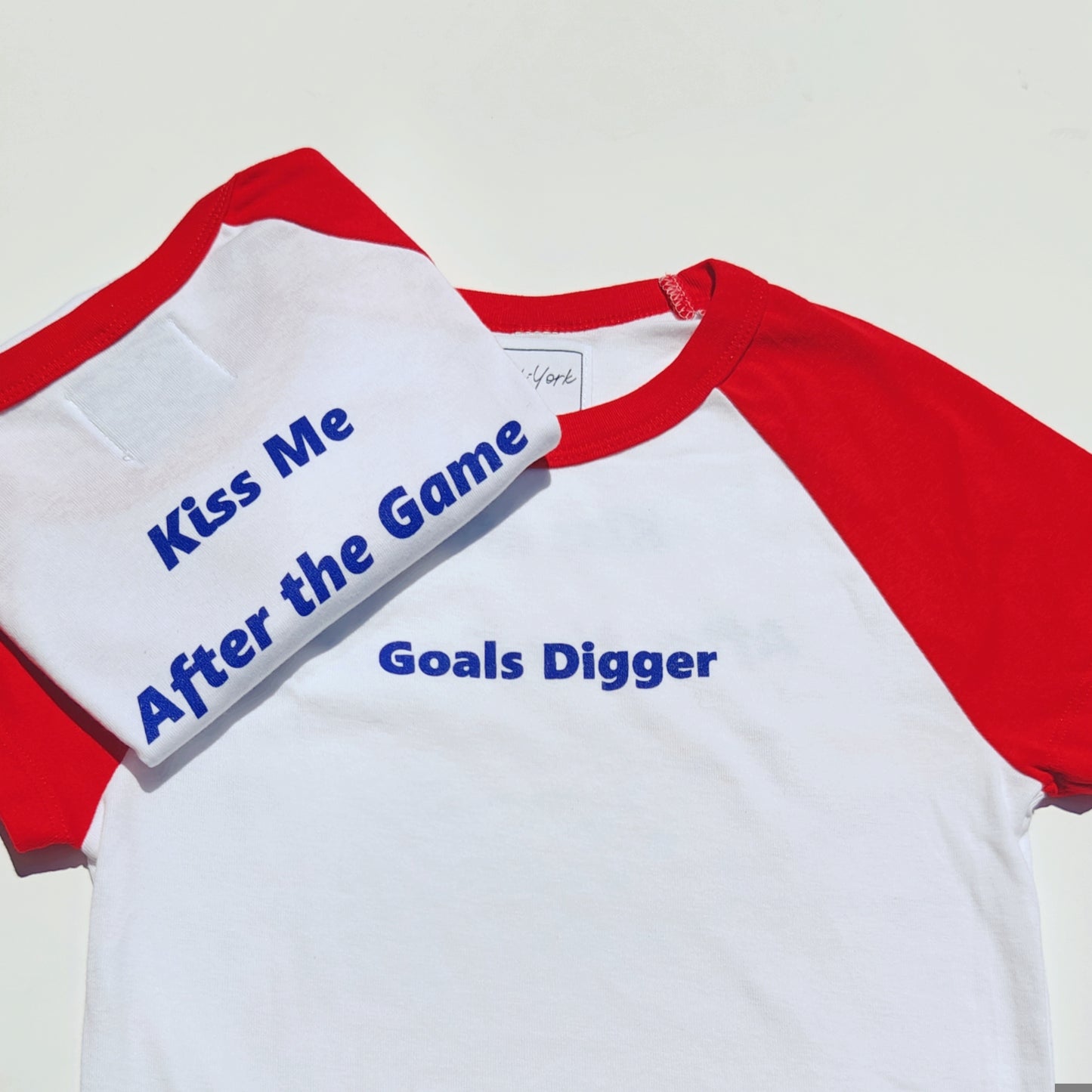 Tee Goals digger Wom